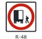La siguiente señal (R-48), significa: 
a) Los peatones deben circular por la derecha y los camiones por la izquierda 
b) Los peatones deben tener cuidado con los camiones. 
c) Zona de carga y descarga. 
d) Ninguna de las alternativas es correcta.