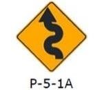La siguiente señal (P-5-1a) , le advierte al conductor que: 
a) Se aproxima a una curva y contra-curva a la izquierda. 
b) Se aproxima a una curva y contra-curva a la derecha. 
c) Se aproxima a un camino sinuoso a la derecha. 
d) Se aproxima a un...