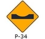 La siguiente señal (P-34), le advierte al conductor que: 
a) La vía está en mal estado y tiene baches. 
b) Se aproxima a un resalto. 
c) Se aproxima a un rompe muelles.  
d) Se aproxima a un badén.