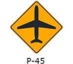La siguiente señal (P-45), indica: 
a) Proximidad a un aeropuerto.  
b) Proximidad a una pista de aviones. 
c) Vuelo de aviones a baja altura. 
d) Aviones que generan ruido.