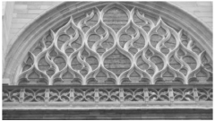 This tracery exemplifies the flame-like forms that give this style its name: