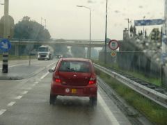 miniauto herkenbaar aan de ronde plaat met rode rand met daarop het getal 45