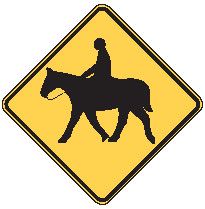 This warning sign means?

- No motor vehicles allowed
- Racetrack ahead
- Equestrians ahead or crossing