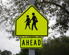This sign means?

- Pedestrian crossing ahead
- School advance warning, you're entering a school zone
- No pedestrians allowed