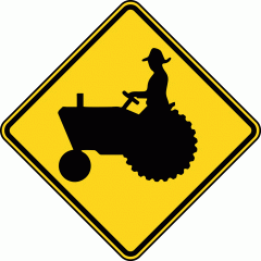 This warning sign means?

- Farm vehicles ahead or crossing
- Trucks ahead or crossing
- Trucks with lugs allowed