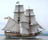 a two-masted, square-rigged vessel with an additional gaff sail on the mainmast / or, a prison, especially on a warship