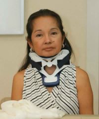GA Gloria Arroyo in a neck brace