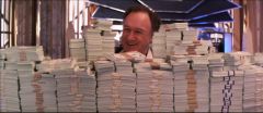 GH Gene Hackman stacking dollar bills