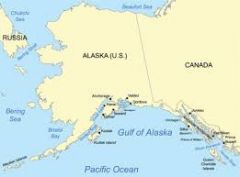 Part of the Pacific Ocean and is on Canada's west side and Alaska's south side.