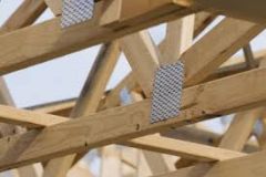 metal or wood used to connect/strengthen joints of 2+ separate components (truss componts) into a load-bearing unit