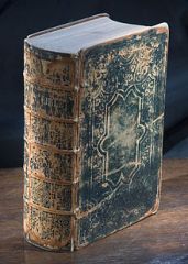 - A book made up of a number of sheets of paper, vellum, or similar
- Hand-written 
- Usually stacked and bound by fixing one edge and with covers thicker than the sheets, but sometimes continuous and folded concertina-style.