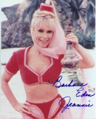 Barbara Eden

Nodding with folded arms at her bottle