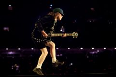 Angus Young

Chicken walking in school boy outfit