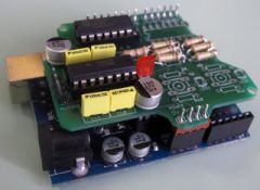 Control motors from an Arduino.   This shield may no longer be available, or may never have been produced commercially. It appears to be a prototype that never went into production in this form, although an updated version was produced: blushingb...