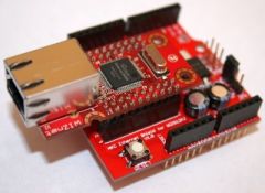 Based on the WIZ812MJ module by Wiznet, which uses the same W5100 chip as the official Arduino Ethernet shield.