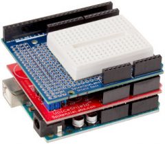 The Shield Dock is a versatile prototyping shield that can be used in several different ways:   1. With a traditionally shaped Arduino, as a prototyping shield.  2. As a pin break-out for your other shields to a breadboard, or built into a perma...