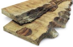 Bark, or lack of wood from any cause, on edge or corner of a piece of wood.