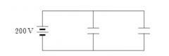 To store a total of 0.040 J of energy in the two identical capacitors shown, each should have acapacitance of: