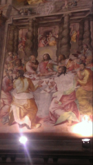 Last Supper; Judas is turned towards the audience with a bag of money in his hand