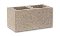 A block or brick cast of portland cement and suitable aggregate with or without admixtures.