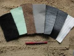 Fabric that is often used in conjunction with soil to protect, separate, or prevent erosion
