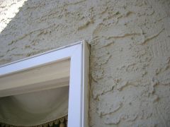 An exterior finish, often textured, composed of portland cement, lime, and sand mixed with water. Installed with at least two coats over a masonry wall, it is used for fine decorative work. Pigments may be mixed into the final coat, or it can be p...