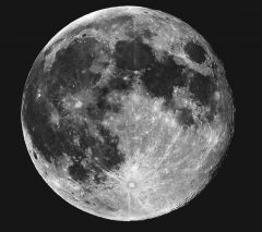 When the moon is half way through its cycle, reflecting light which appears to be the whole moon on earth