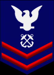 Petty Officer Second Class - PO2
ZERO TWO red chevrons, a rating designator, and a white eagle on a field of blue.
