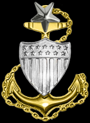 Senior Chief Petty Officer - SCPO
a gold anchor and silver shield with ZERO ONE silver star on top.