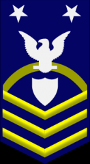 Command Master Chief Petty Officer E-9


ZERO ONE gold rocker,

ZERO THREE gold chevrons, a white shield, a white eagle, and ZERO TWO white stars on a field of blue.