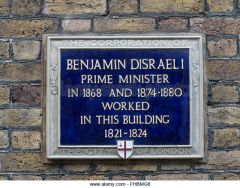 Where is there a plaque of Benjamin Disraeli in the City ?