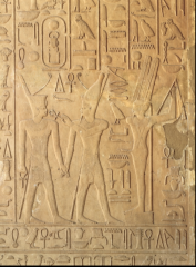 Senworset I led by Atum to Amun-R is an example of what the of relief sculpture?