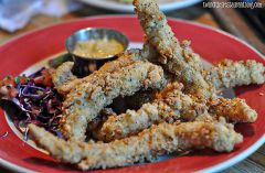 Catfish dusted with cornmeal and fried crisp, served with jalapeño tartar sauce. 9.95