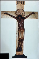 How is the depiction of Jesus on the Crucifix of Archbishop Gero, Cologne Cathedral different
than the Byzantine styles?
