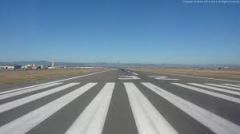 longitudinal stripes at beginning of runway; can be used for landing