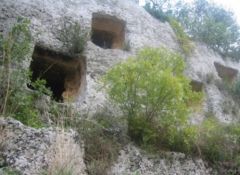 Neolithic Cemetery at Sicily features rock-cut __ which were covered later.