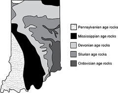 The generalized bedrock geologic map of Indiana shows that over the southern half of the state the youngest rocks are exposed to the west while the bedrock becomes increasingly older toward the east. Which of the following best describes the cause...