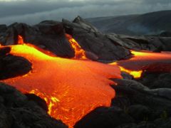 Lava flows slowly. Forms shield volcanoes.