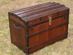 Tree trunk
Other word: steamer trunk 
Nowadays it's hardly to find steamer trunks in some furniture shops