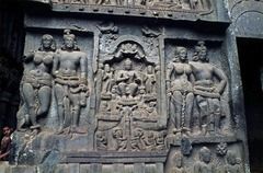 two couples worshipping triratna throne with buddhapada (footprints of the buddha)