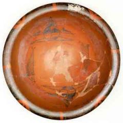 bowl with human head and fish designs