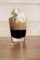 1/4 oz Bailey's® Irish cream
1/2 oz amaretto almond liqueur

Pour liqueurs into a shot glass and top with whipped cream. Have an individual place their hands behind their back, then; pick-up the filled shot glass with their mouth, tilt head ba...