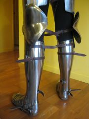 a jambeau - piece of armor for the leg [n -s] Back: D, S