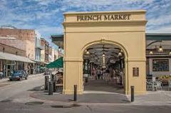 Its 
buildings have been avibrant part of the New Orleans scene for more than
 165years.  The French Market is anchored at its down river end by the 
popular farmer's market areas of long open sheds filled with fresh 
fruits and vegetables...