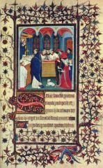 The process of adding elaborate decoration and illustrations to a manuscript.