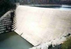 Dam- a structure built across a river to control the river's flow.