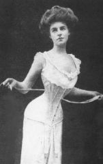 1906-1909

The mono bosom corset squished the girls together and created a smooth line as you can see in the image.

This corset also created the "S" shape.

Take note of how low this makes the chest look.