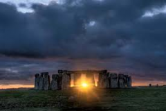 You could see the sunset on the winter solstice through the stones. You would have to be facing SW to see it.