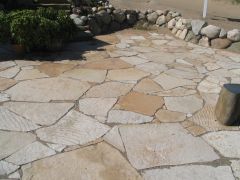 Flat stones, from 1" to 4" thick, used for rustic walls, steps, floors, etc.