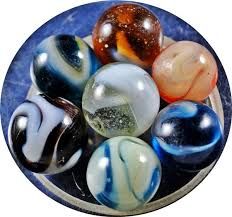a toy marble made of marble, alabaster, or glass.